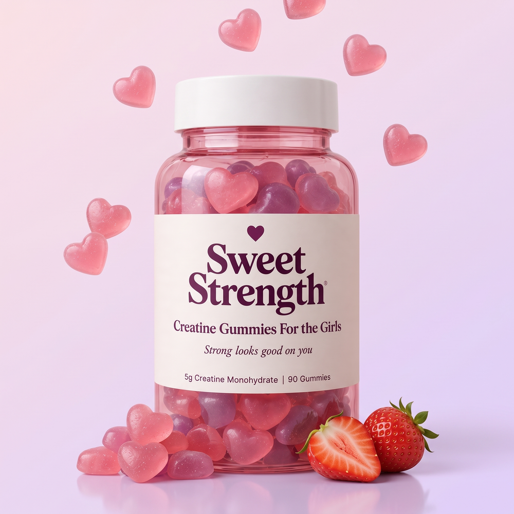 Sweet Strength creatine gummies bottle with pink heart gummies and strawberries